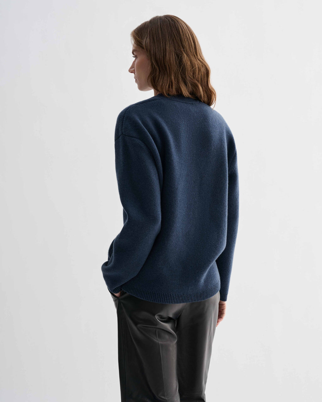 Elara blue cashmere sweater, luxury knitwear. Relaxed fit, eased shoulder, straight body. Compact, dense knit