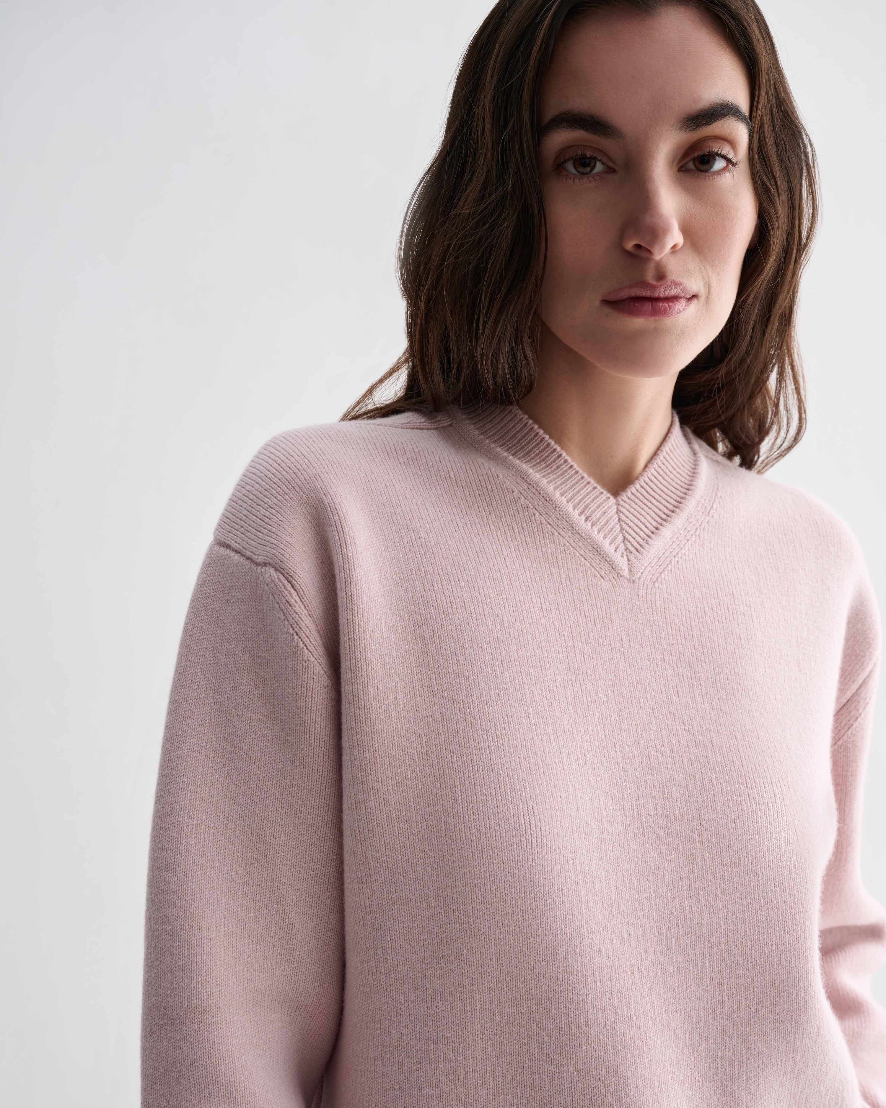 Pink cashmere Elara sweater by Veronica De Piante, shown as a cozy knitwear piece with a soft, textured fabric and classic fit.