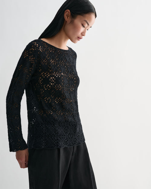 Black Veronica De Piante Elodie Silk Crochet Top, showcasing intricate knitwear design and fine craftsmanship.