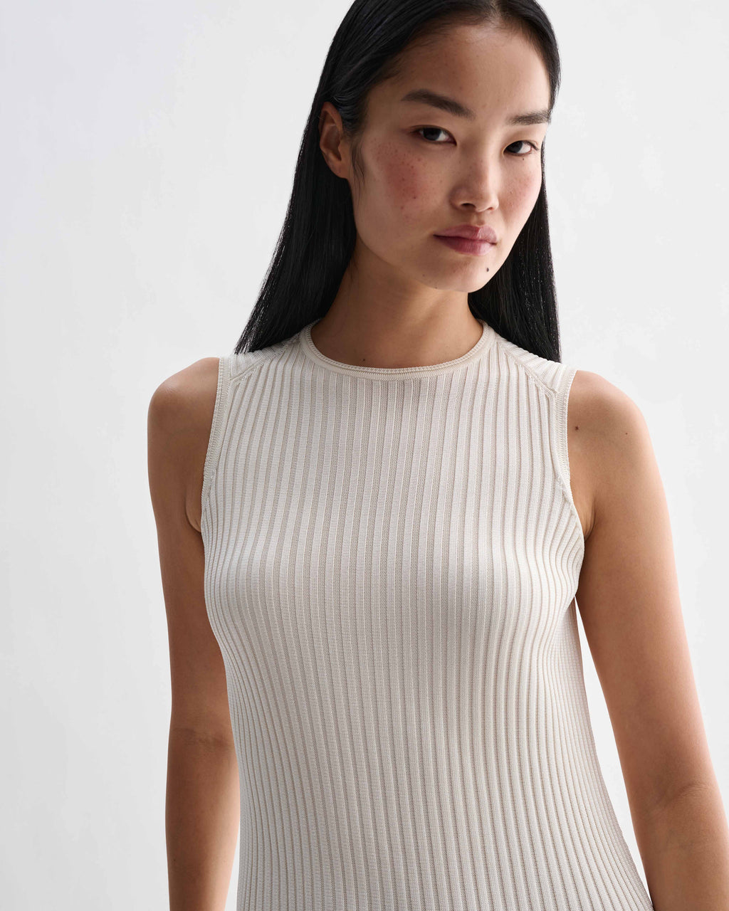 Off-white Gabby dress by Veronica De Piante featuring a flowing viscose fabric and elegant, relaxed fit.