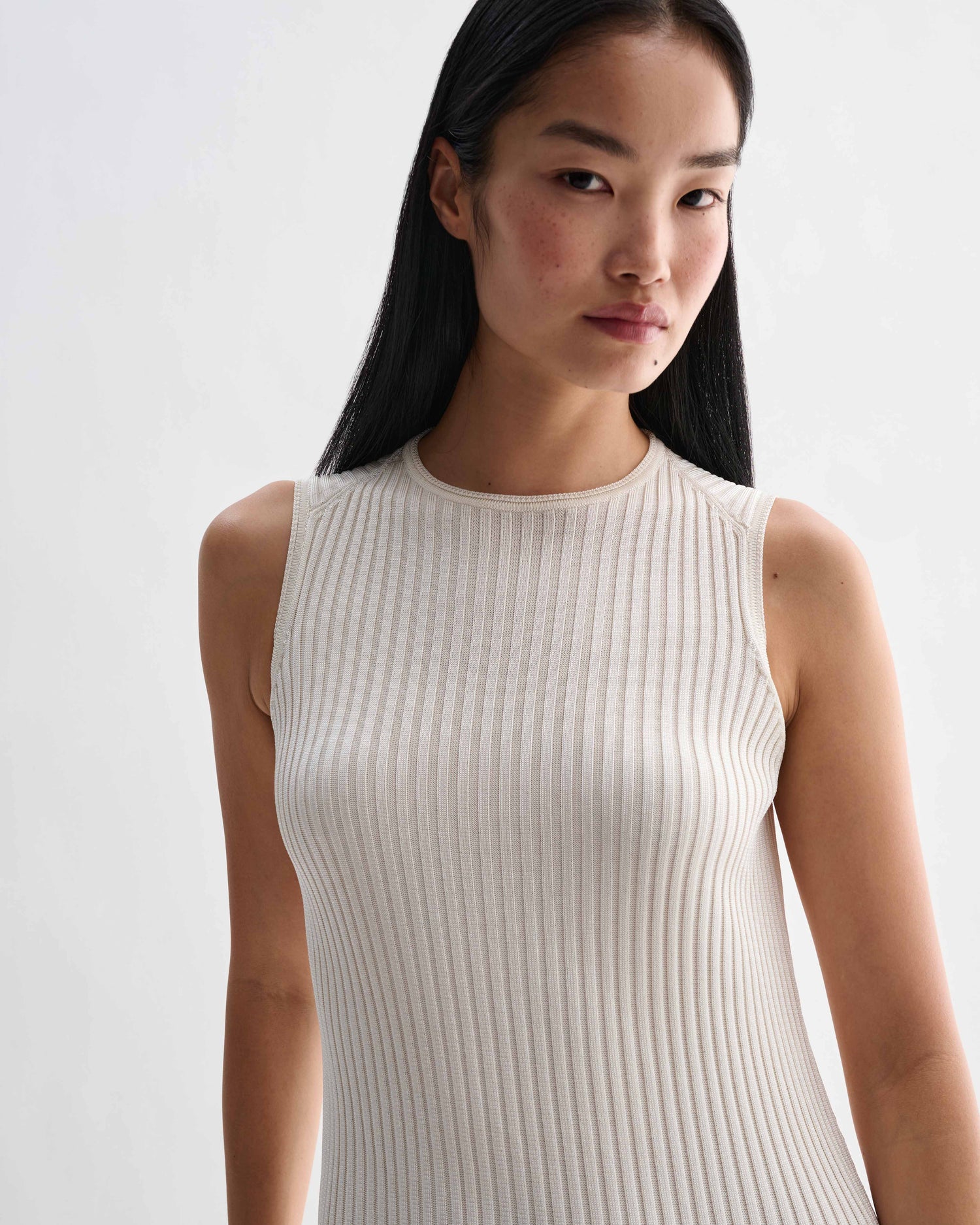 Off-white Gabby dress by Veronica De Piante featuring a flowing viscose fabric and elegant, relaxed fit.