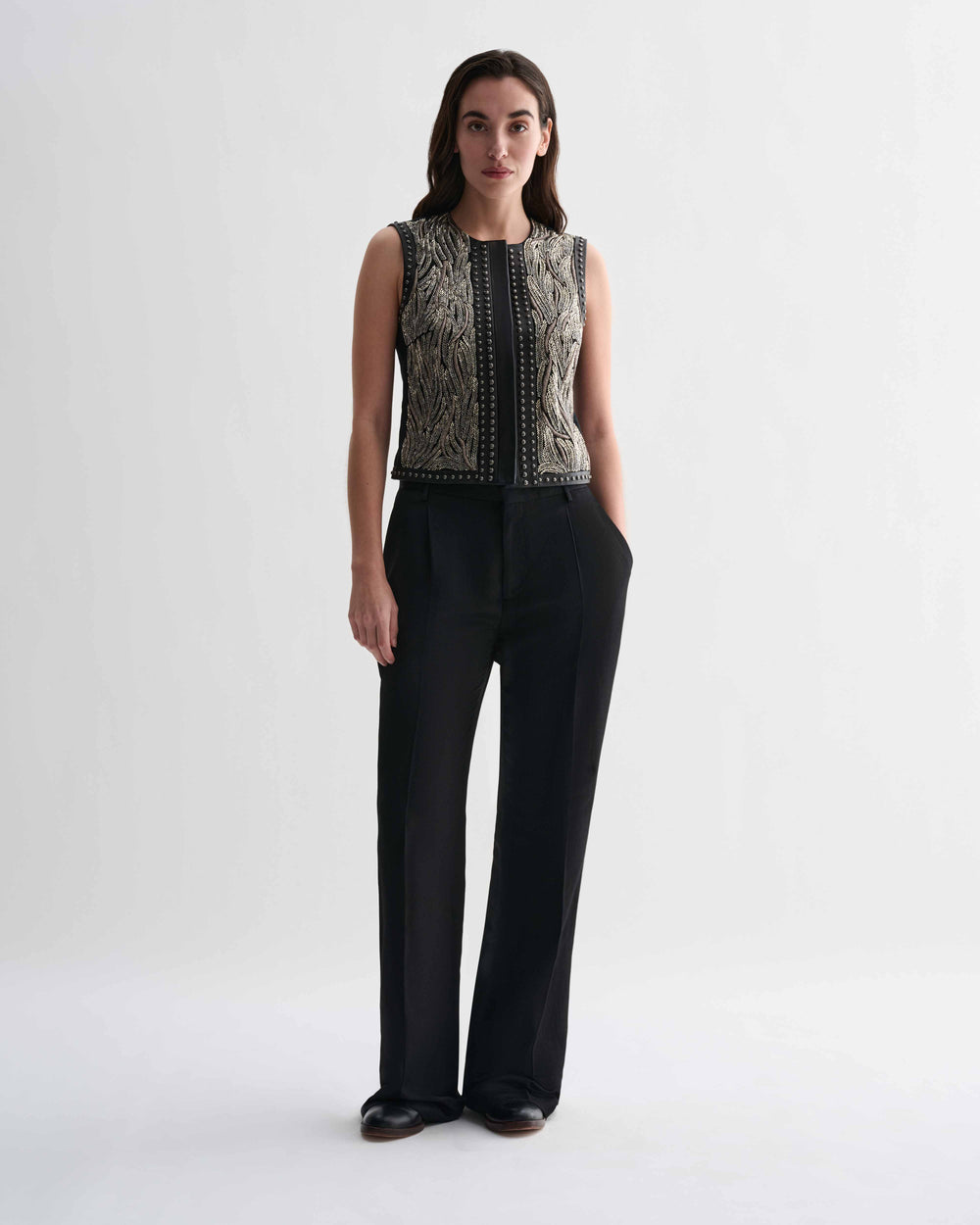 Black Ginevra vest by Veronica De Piante, stylish sleeveless top with a fitted design, shown on a neutral background.