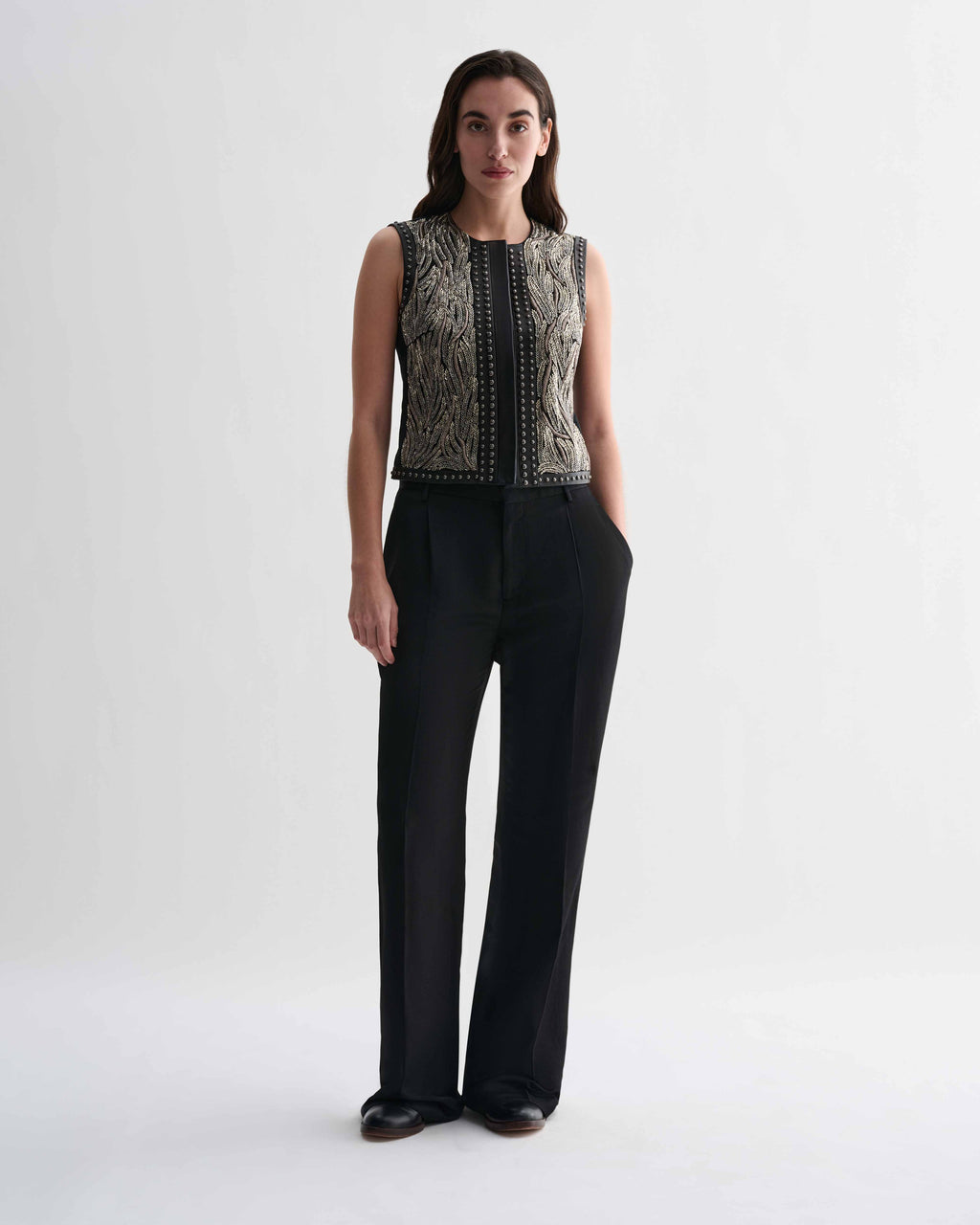 Black Ginevra vest by Veronica De Piante, stylish sleeveless top with a fitted design, shown on a neutral background.