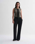 Black Ginevra vest by Veronica De Piante, stylish sleeveless top with a fitted design, shown on a neutral background.