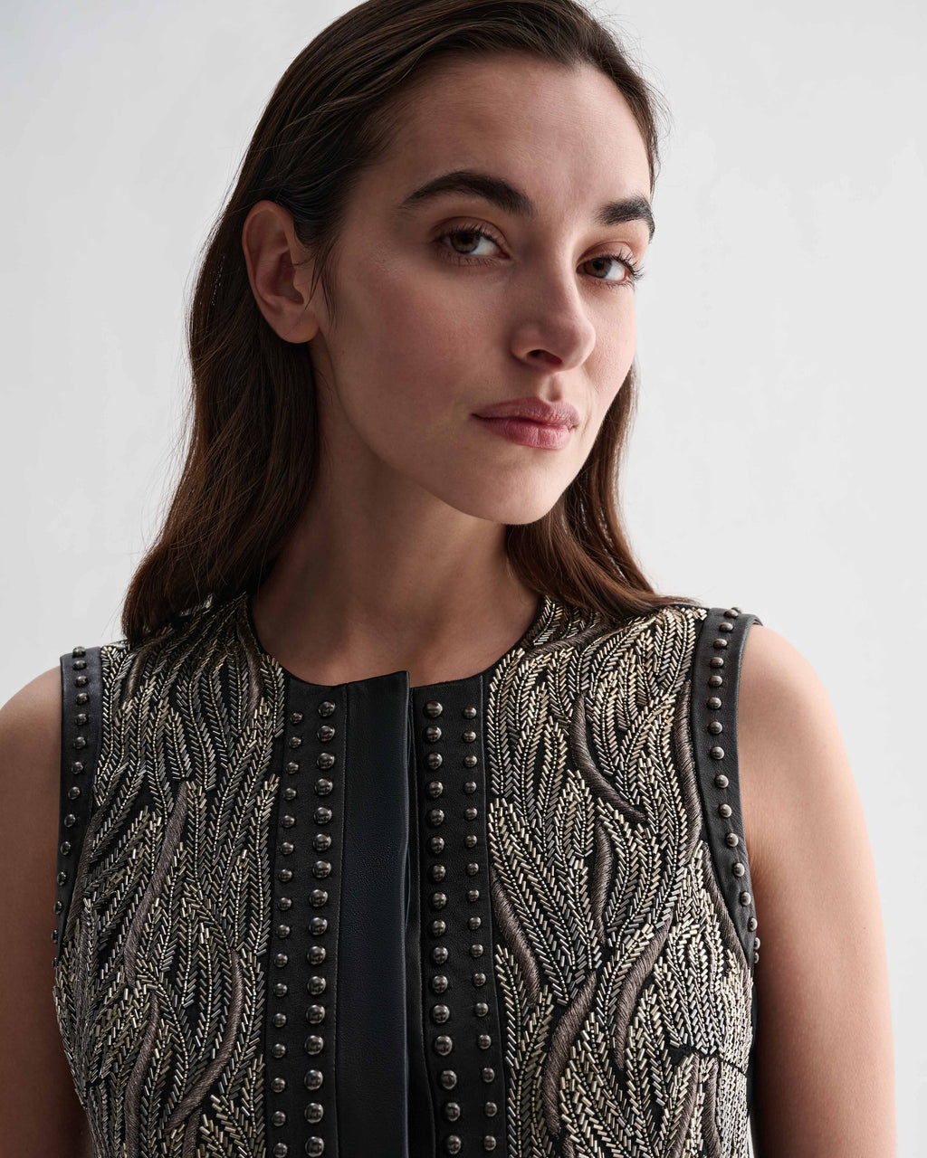 Black Ginevra vest by Veronica De Piante, showcasing a stylish sleeveless top with a fitted design and textured fabric.
