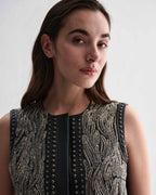 Black Ginevra vest by Veronica De Piante, showcasing a stylish sleeveless top with a fitted design and textured fabric.