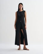 Black silk Hana dress by Veronica De Piante, featuring elegant fabric and stylish design, displayed on a mannequin.