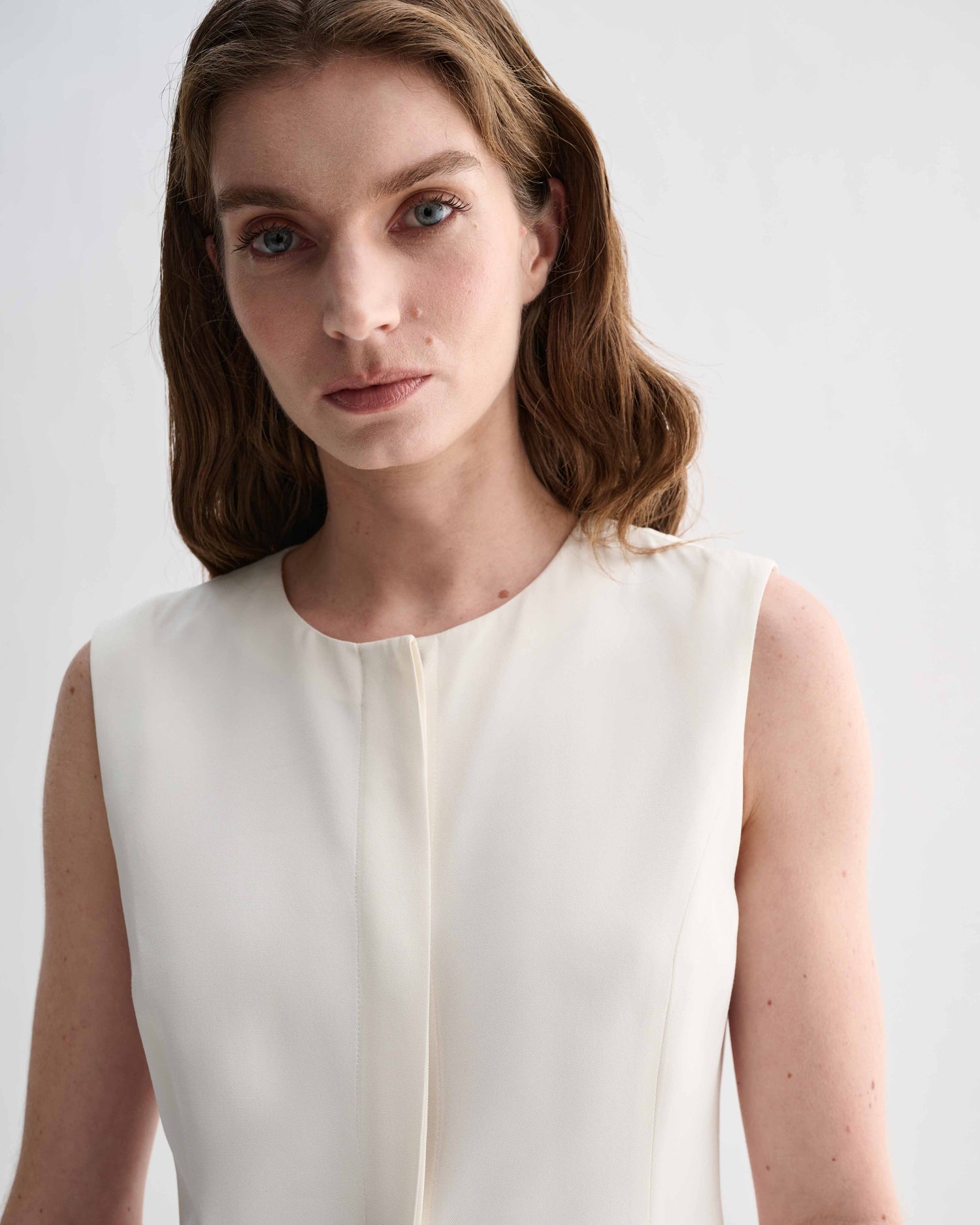 Off-white Hana silk dress by Veronica De Piante, featuring a flowing fit and elegant design, shown on a model.