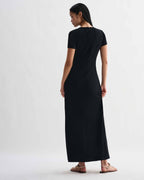 Black Veronica De Piante Harper dress in stretch viscose jersey, showcasing its fitted silhouette on a model.