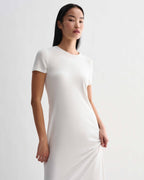 Off-white Harper dress by Veronica De Piante in stretch viscose jersey, showcasing a fitted, elegant design.