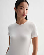 Off-white Harper dress by Veronica De Piante in stretch viscose jersey, featuring a sleek, fitted design with subtle details.