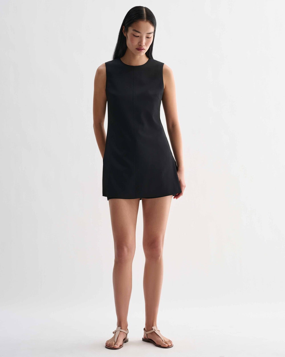 Black silk Honor tunic top by Veronica De Piante, featuring a relaxed fit and elegant drape, displayed on a neutral background.