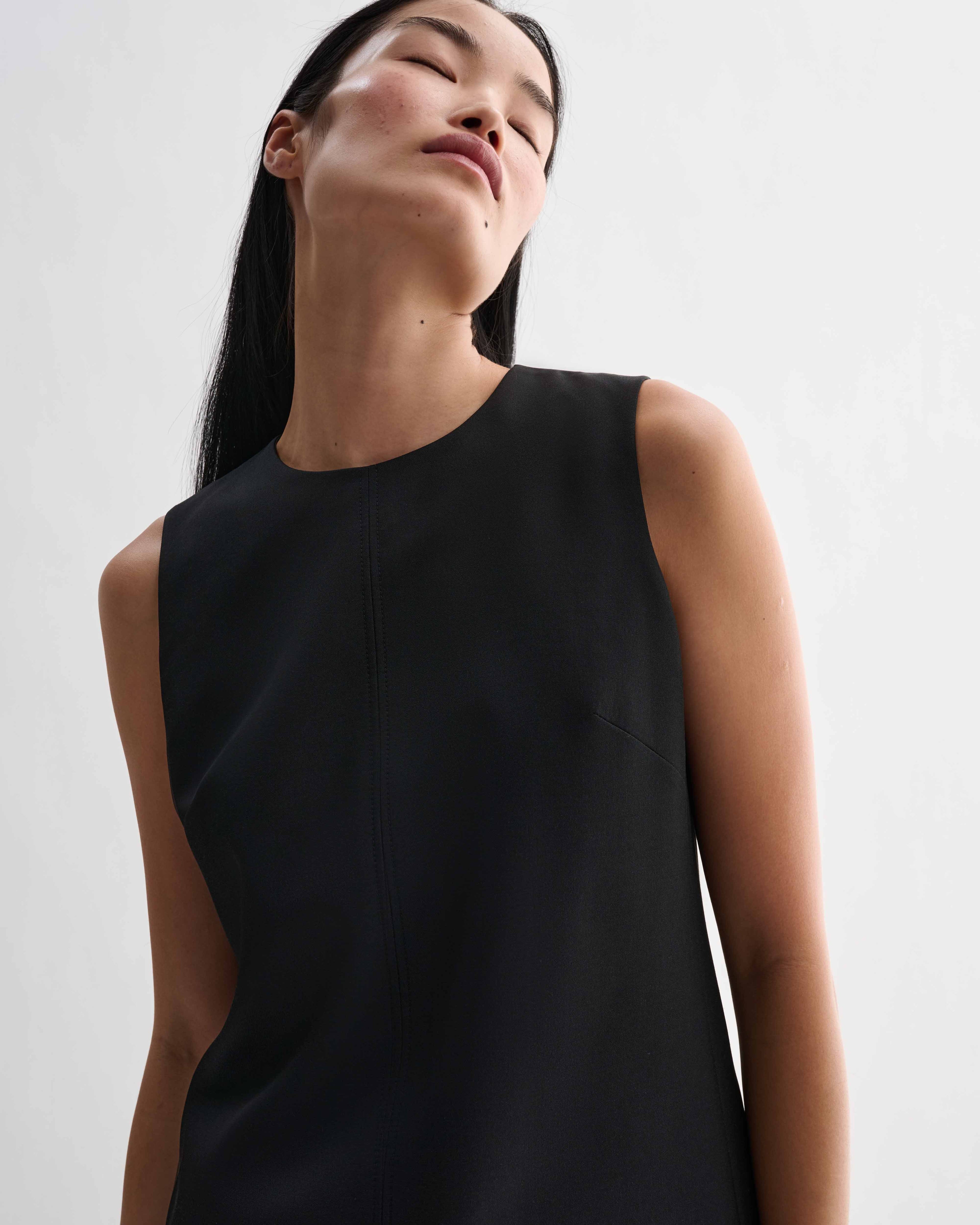 Black silk Honor Tunic top by Veronica De Piante, featuring a sleek, elegant design and smooth fabric.