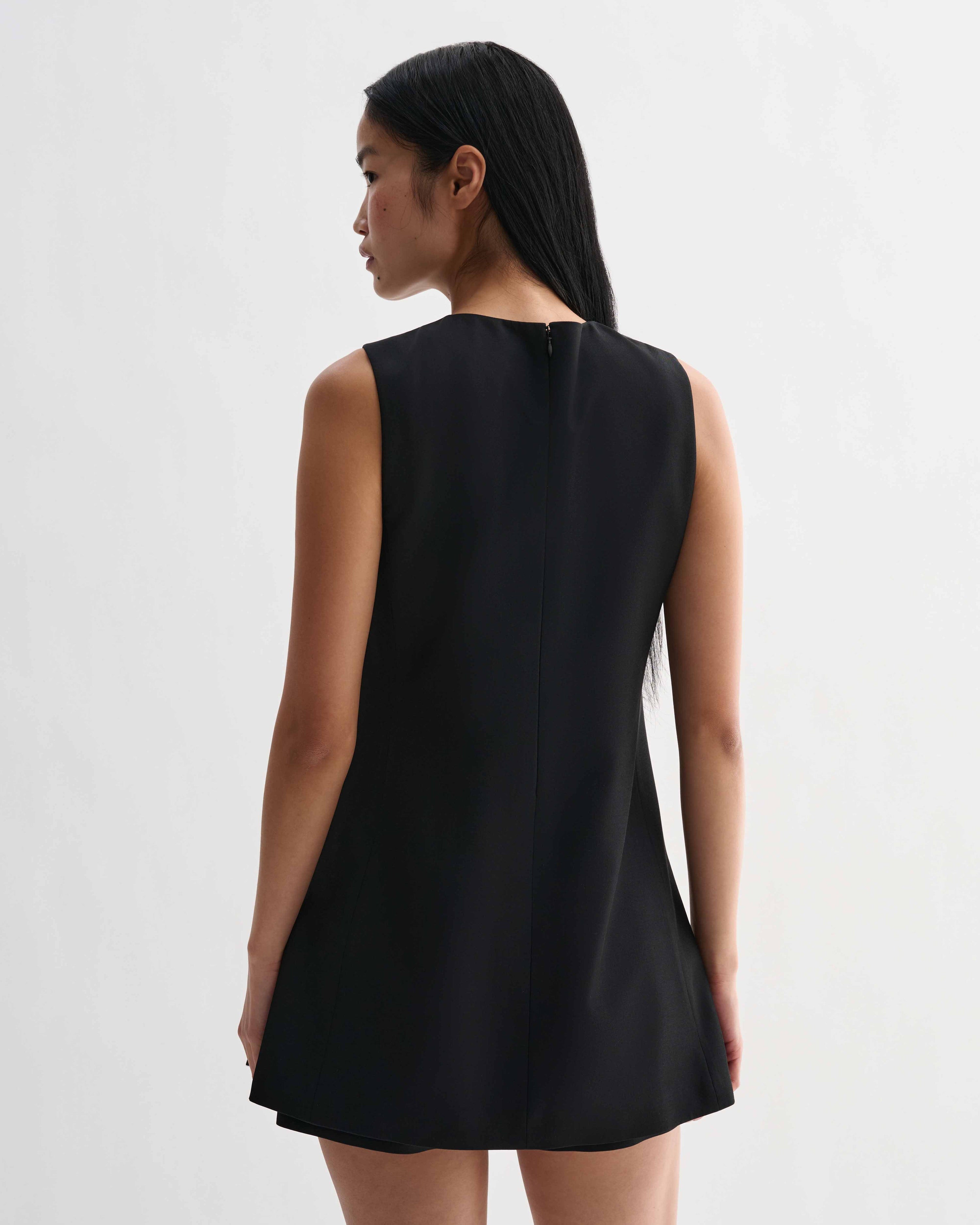 Black silk Honor tunic top by Veronica De Piante, shown on a model with a relaxed fit and elegant design.