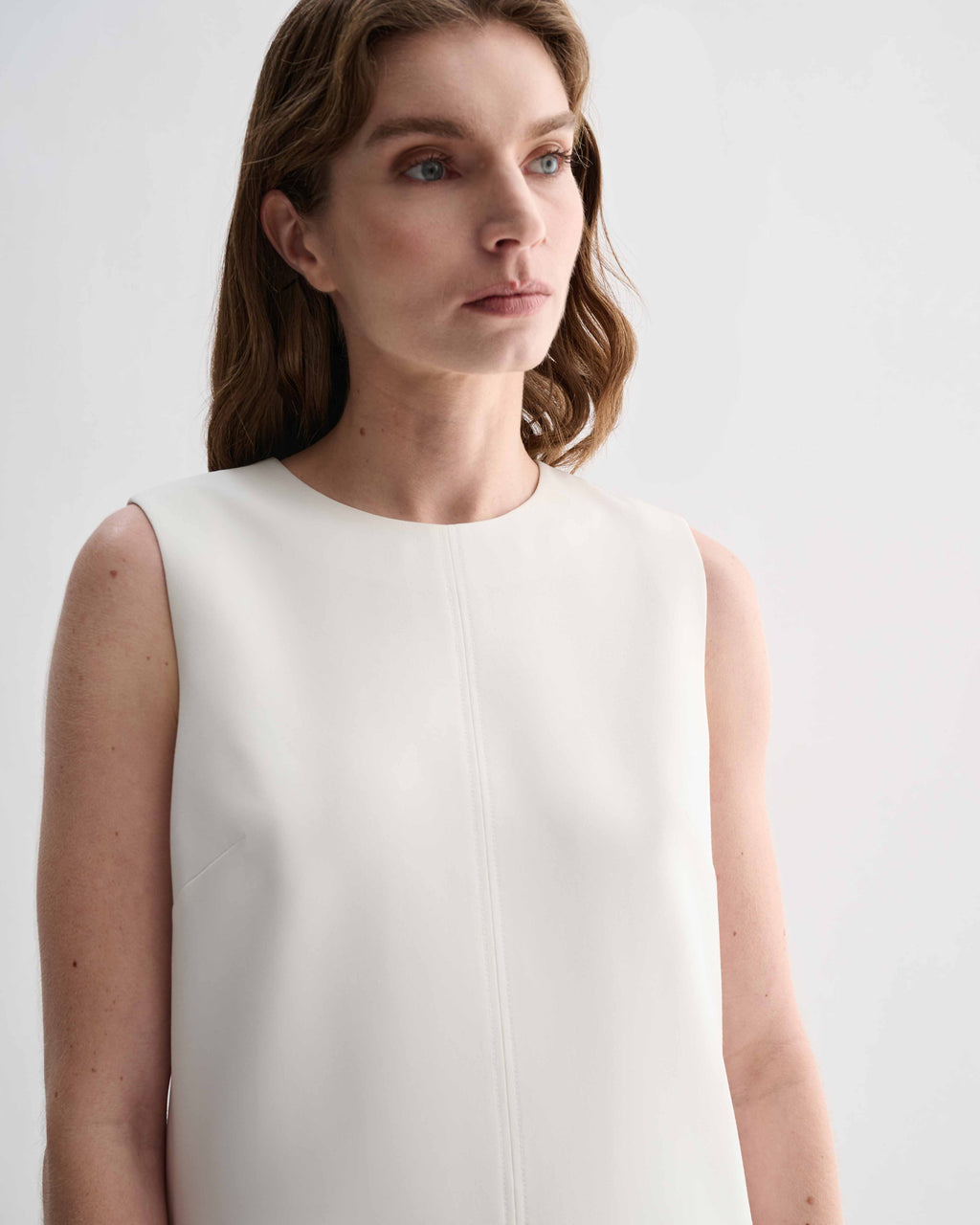 Off-white silk Honor tunic top by Veronica De Piante, shown on a model, featuring a relaxed fit and elegant design.