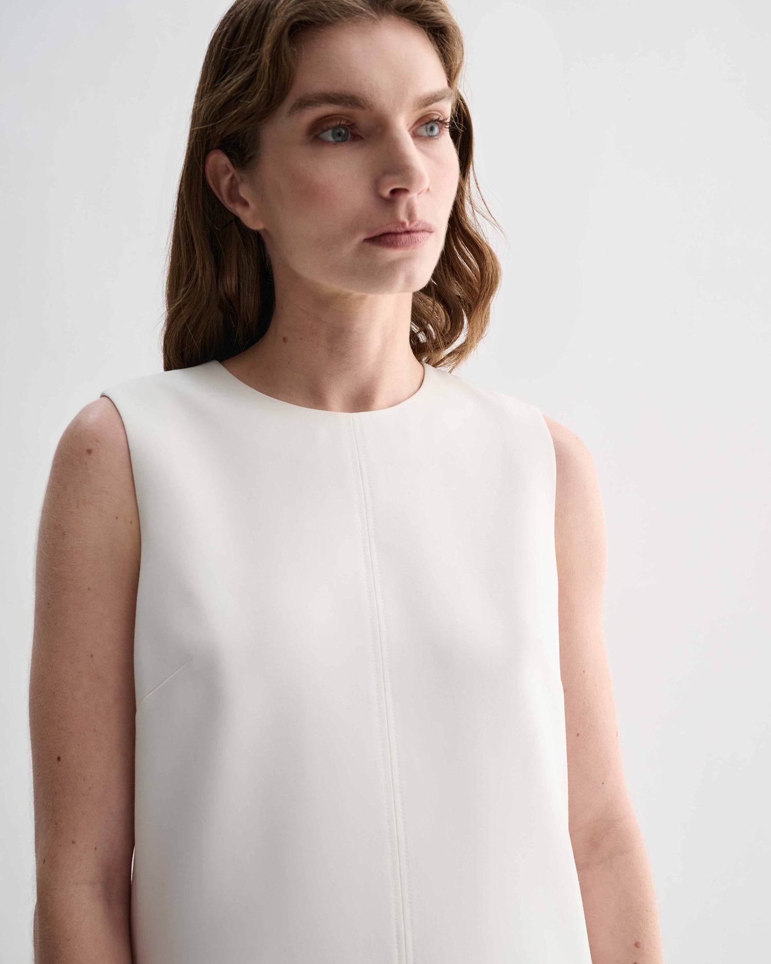 Off-white silk Honor tunic top by Veronica De Piante, shown on a model, featuring a relaxed fit and elegant design.