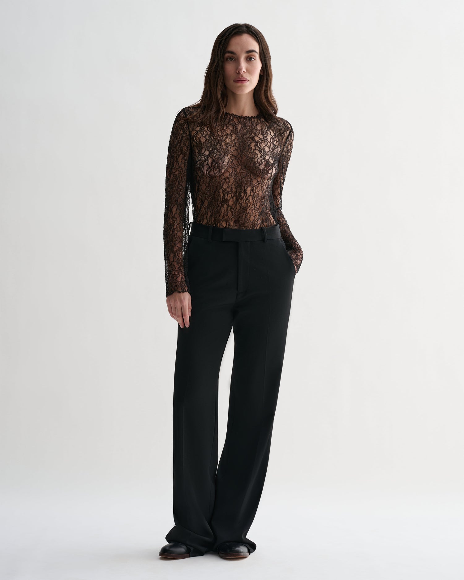 Black lace Isabel Top by Veronica De Piante featuring delicate lace fabric and a fitted silhouette.