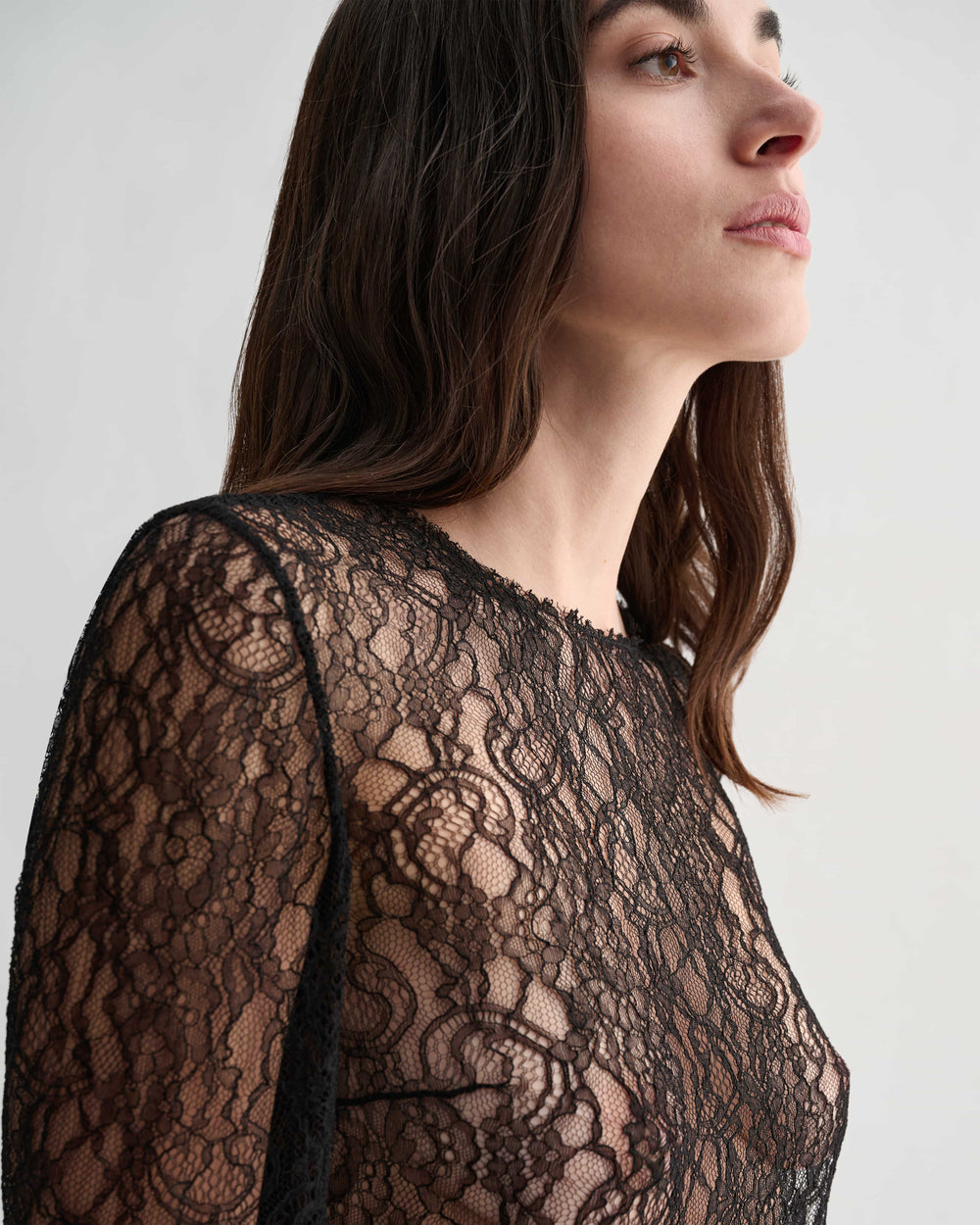 Black lace Isabel Top by Veronica De Piante, featuring delicate lace details and a stylish fit for elegant casual wear.