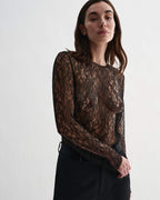 Black lace Isabel Top by Veronica De Piante featuring intricate lace details and a stylish, feminine design.