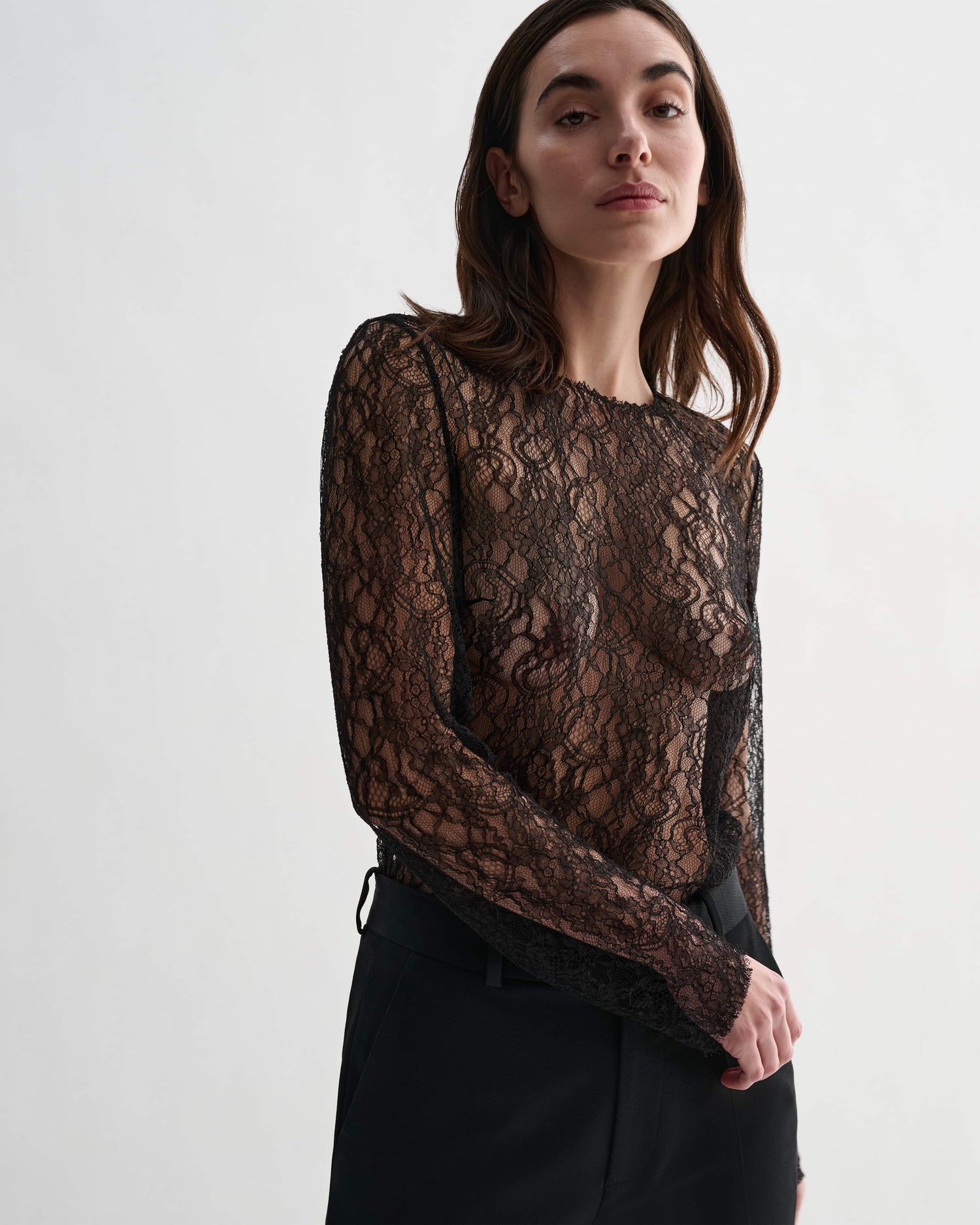 Black lace Isabel Top by Veronica De Piante featuring intricate lace details and a stylish, feminine design.