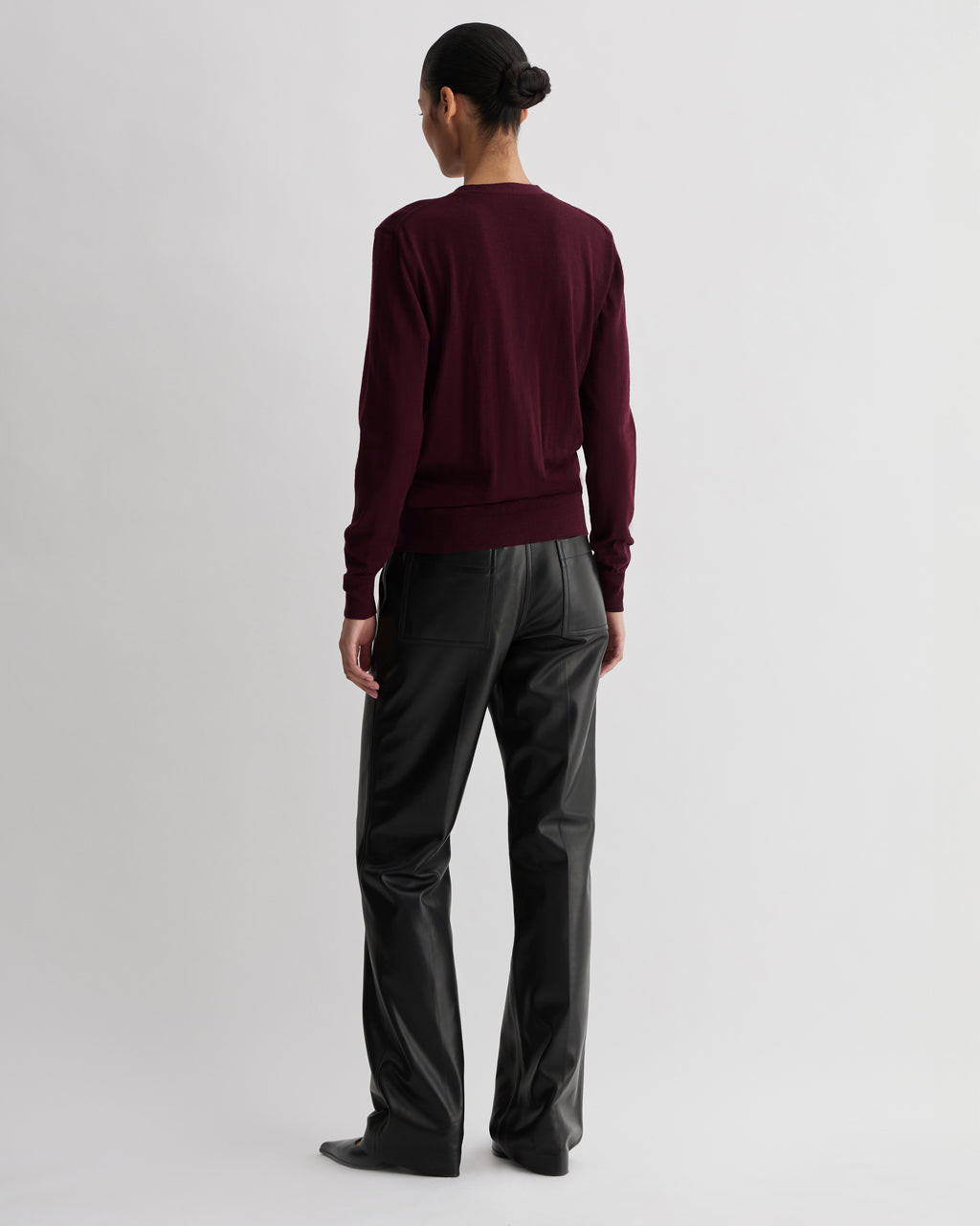 Katie Merino Wool Cardigan in Garnet, stylish knitwear with a cozy fit, featuring a rich red color and textured knit pattern.