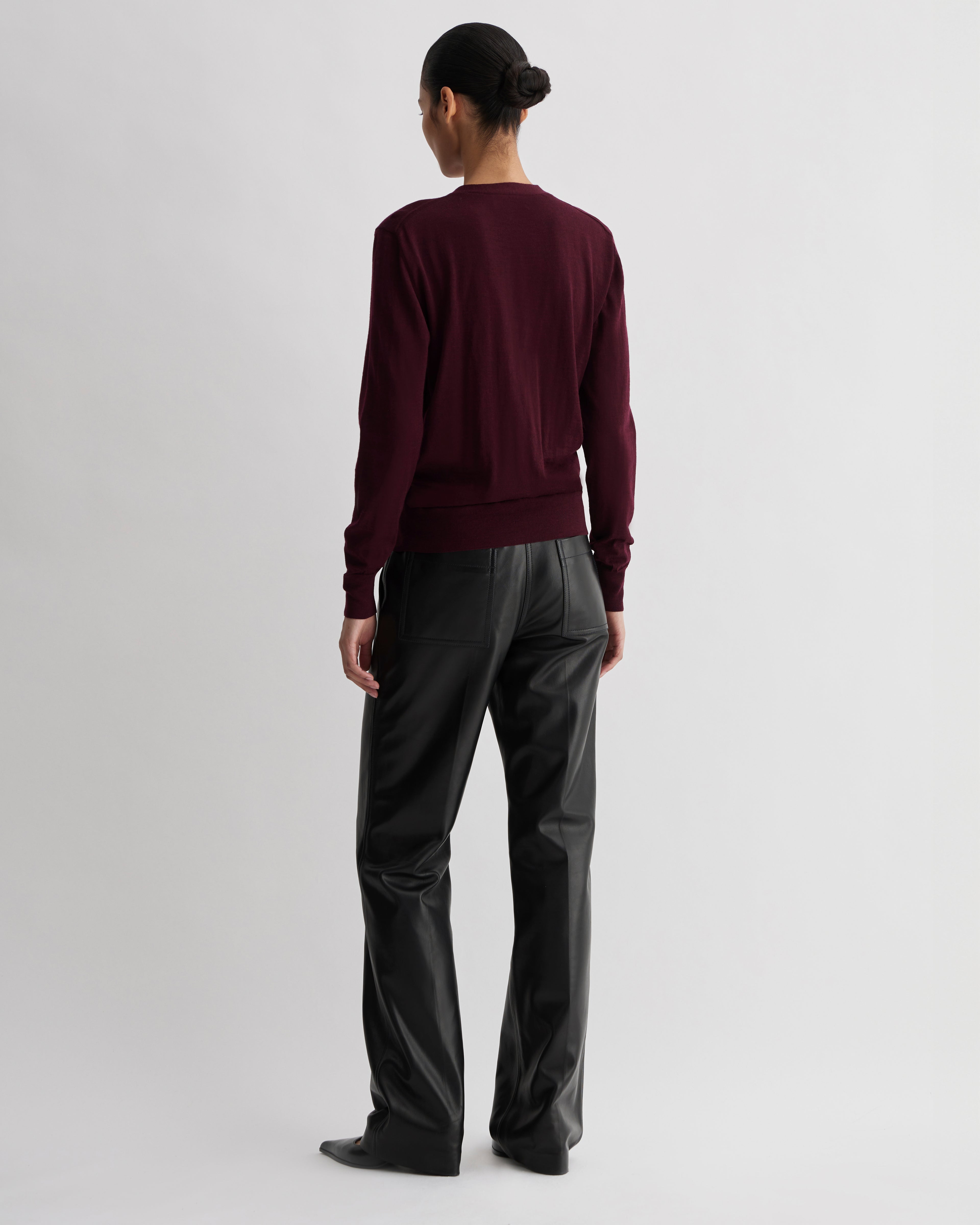 Katie Merino Wool Cardigan in Garnet, stylish knitwear with a cozy fit, featuring a rich red color and textured knit pattern.