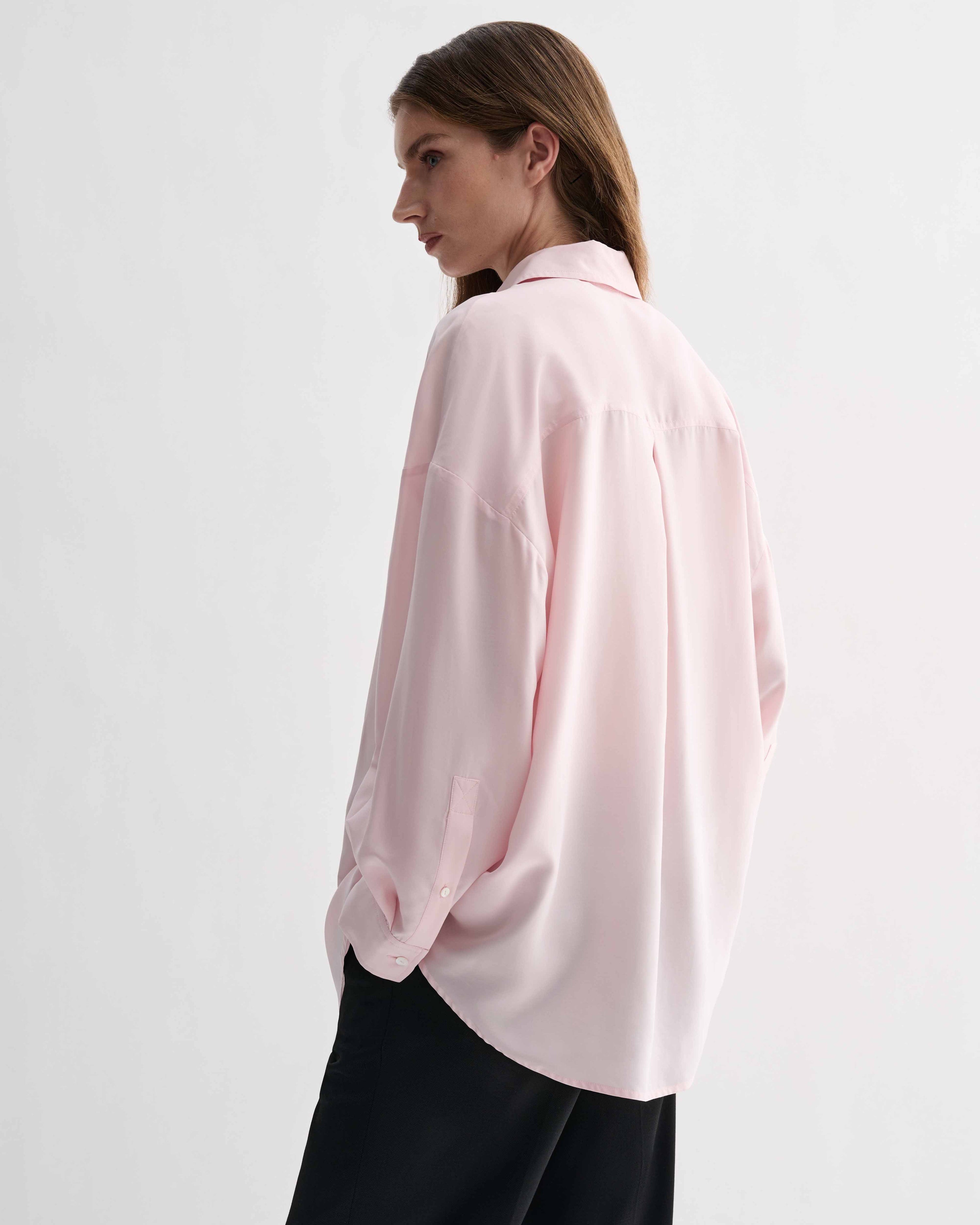Pink silk Maren shirt by Veronica De Piante, featuring a smooth, elegant top with a classic collar and long sleeves.