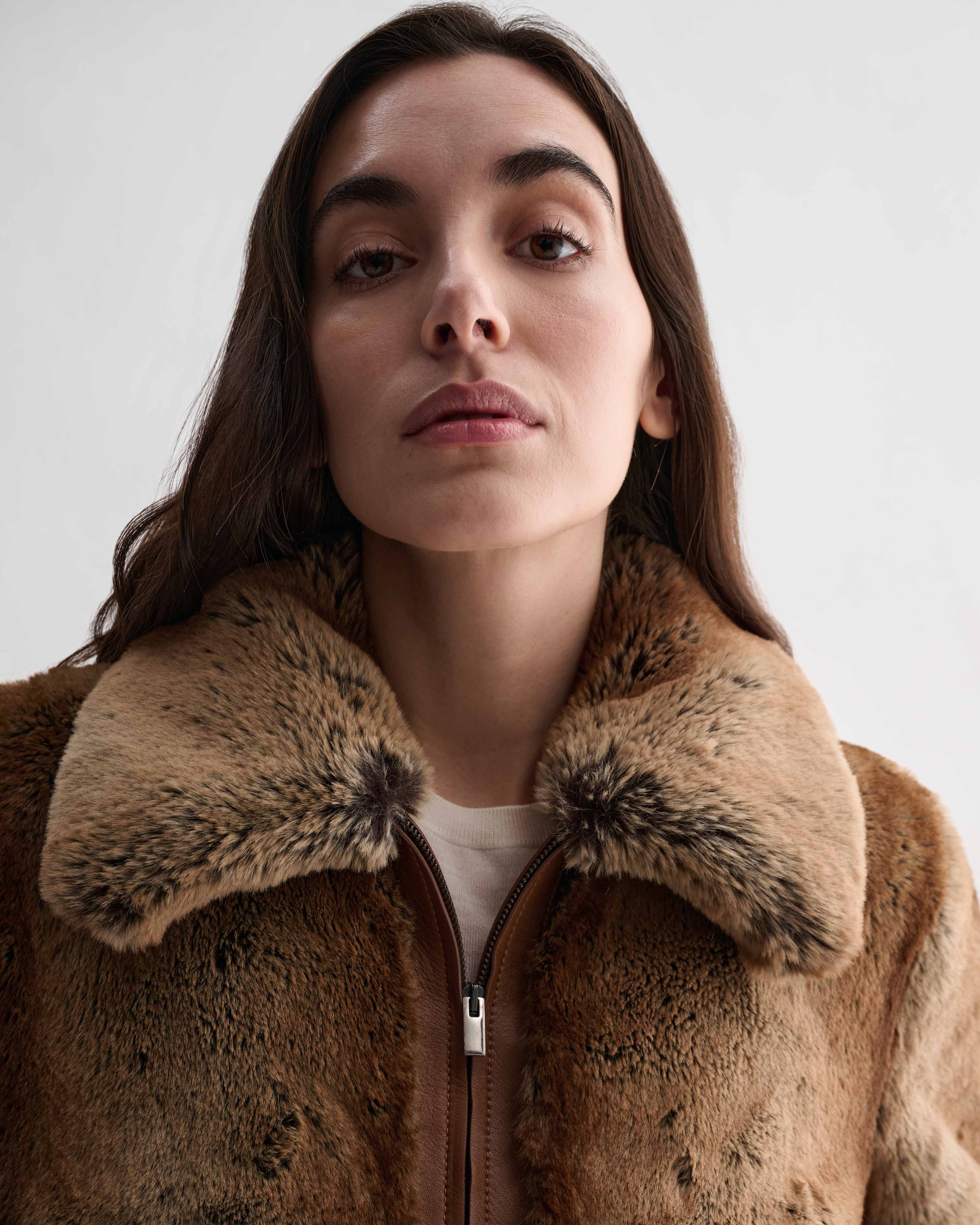 Mireia women's camel faux fur cropped jacket with nappa leather trim. Luxury coat and jacket