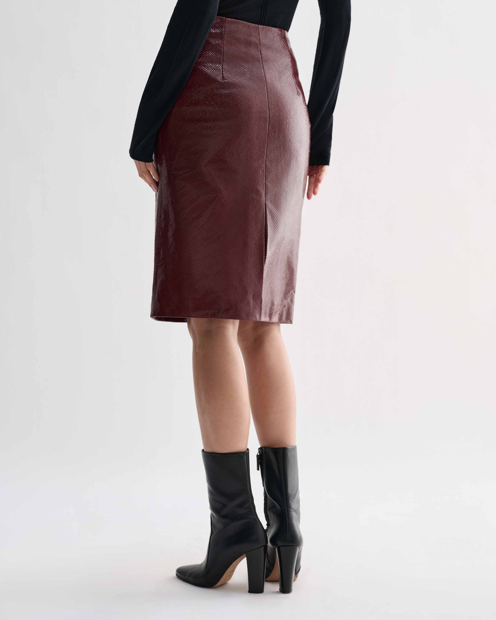 Noelia Dark Red embossed leather pencil skirt with semi-gloss burgundy snakeskin texture. Luxury women's midi skirt