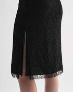 Black lace Nola skirt by Veronica De Piante featuring intricate lace details and a flowing silhouette.