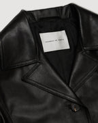 Black Blaire jacket in Nappa leather by Veronica De Piante, shown on a hanger with detailed leather texture and sleek design.