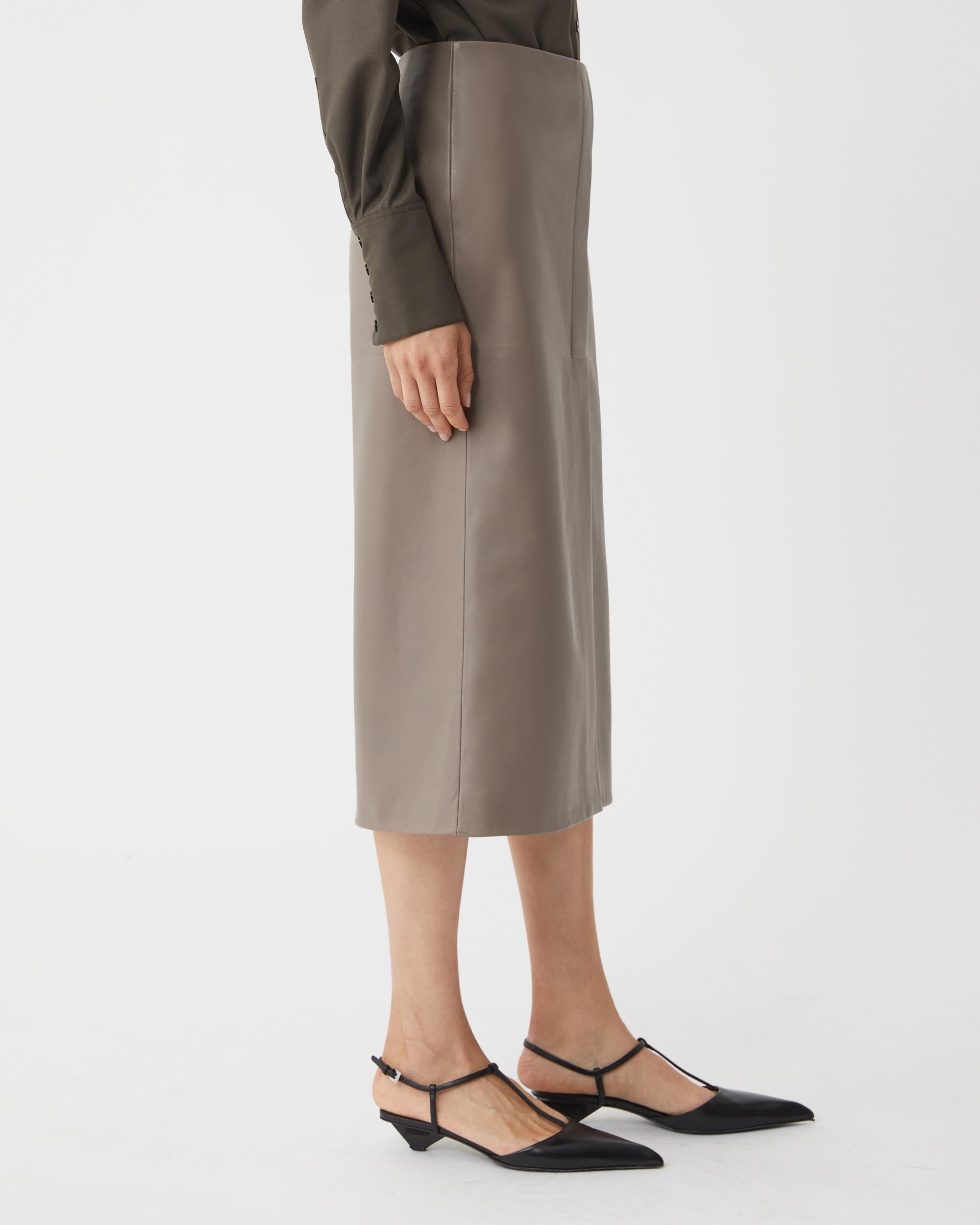 Phoebe Nappa Leather skirt in Smog color, showcasing a sleek design and soft texture, perfect for stylish outfits.