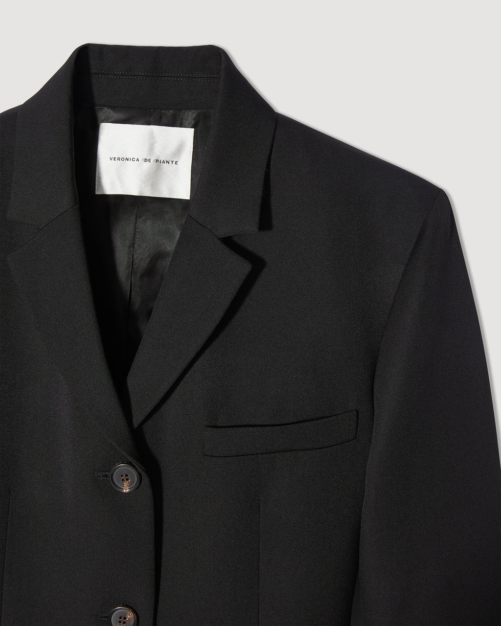 Veronica De Piante Manon coat in black wool, featuring a tailored design and elegant silhouette.