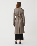 Celine smog Nappa leather coat displayed on a mannequin, showcasing its sleek design and luxurious texture.