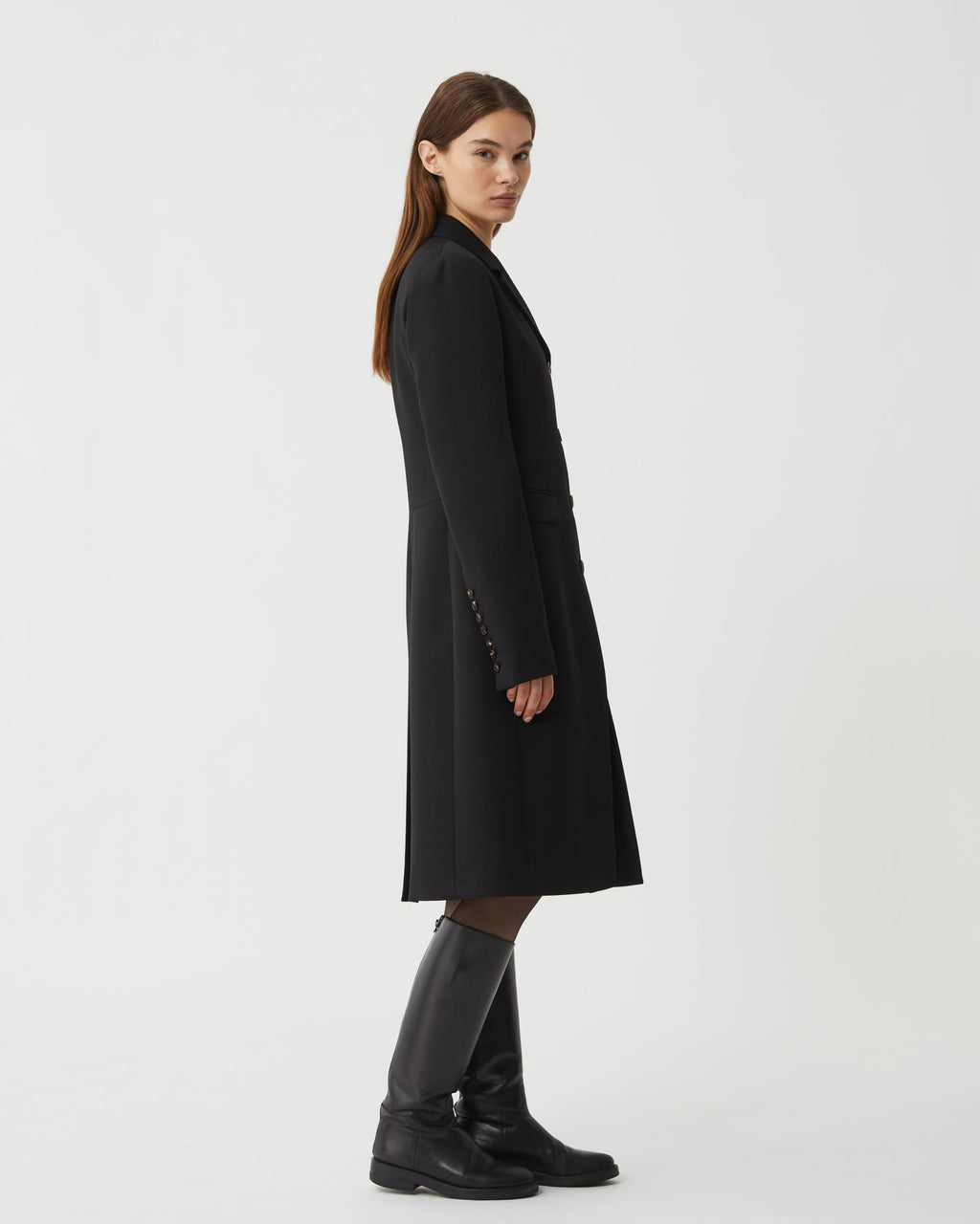 Black wool Manon coat by Veronica De Piante, showcasing a tailored silhouette and elegant design.