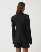 Black wool Faye Jacket by Veronica de Piante, stylish coat with a tailored fit and classic design, perfect for cold weather.