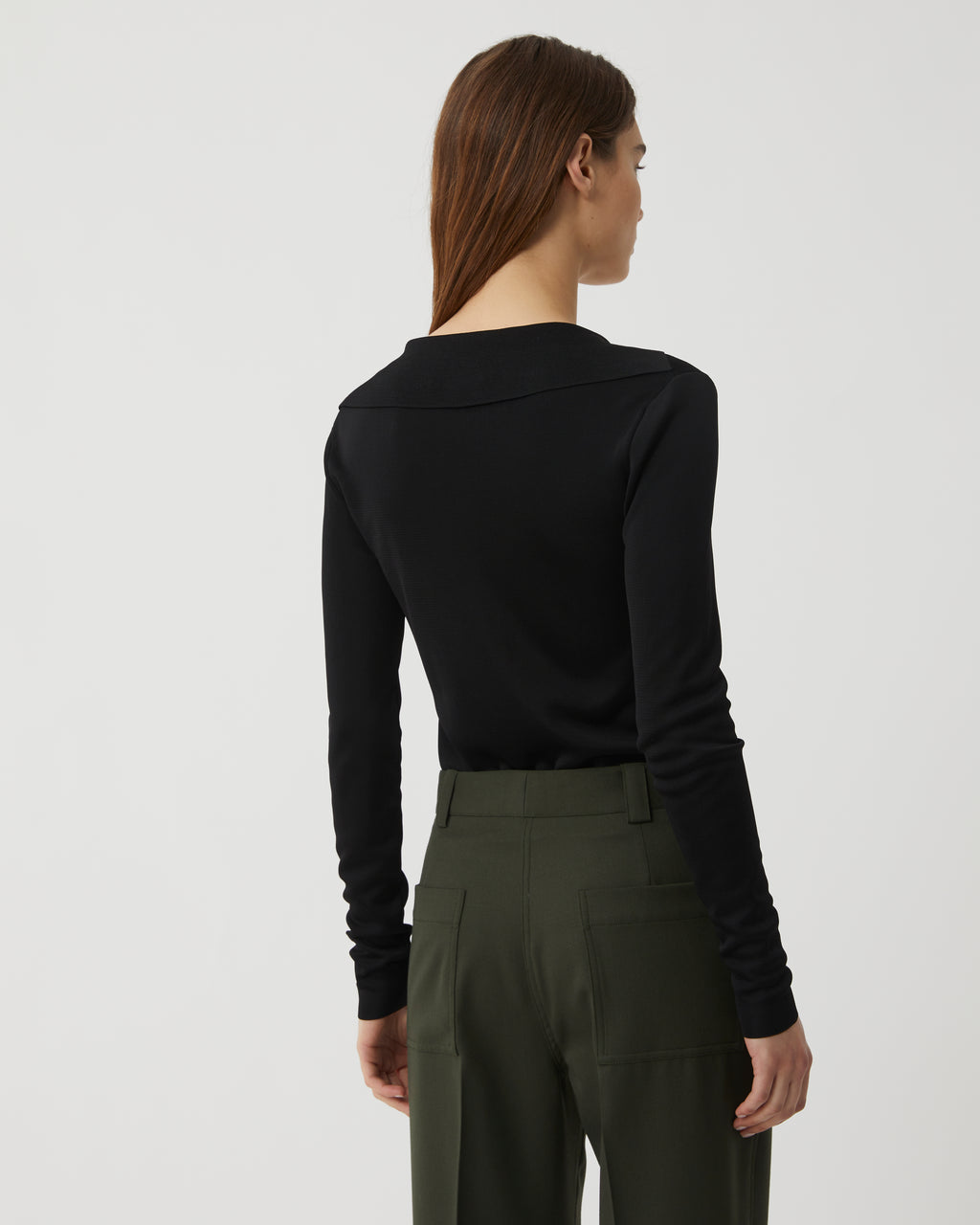 Black Ada Polo knitwear in viscose by Veronica de Piante, featuring a classic collar and button-front design.