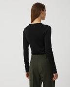 Black Ada Polo knitwear in viscose by Veronica de Piante, featuring a classic collar and button-front design.