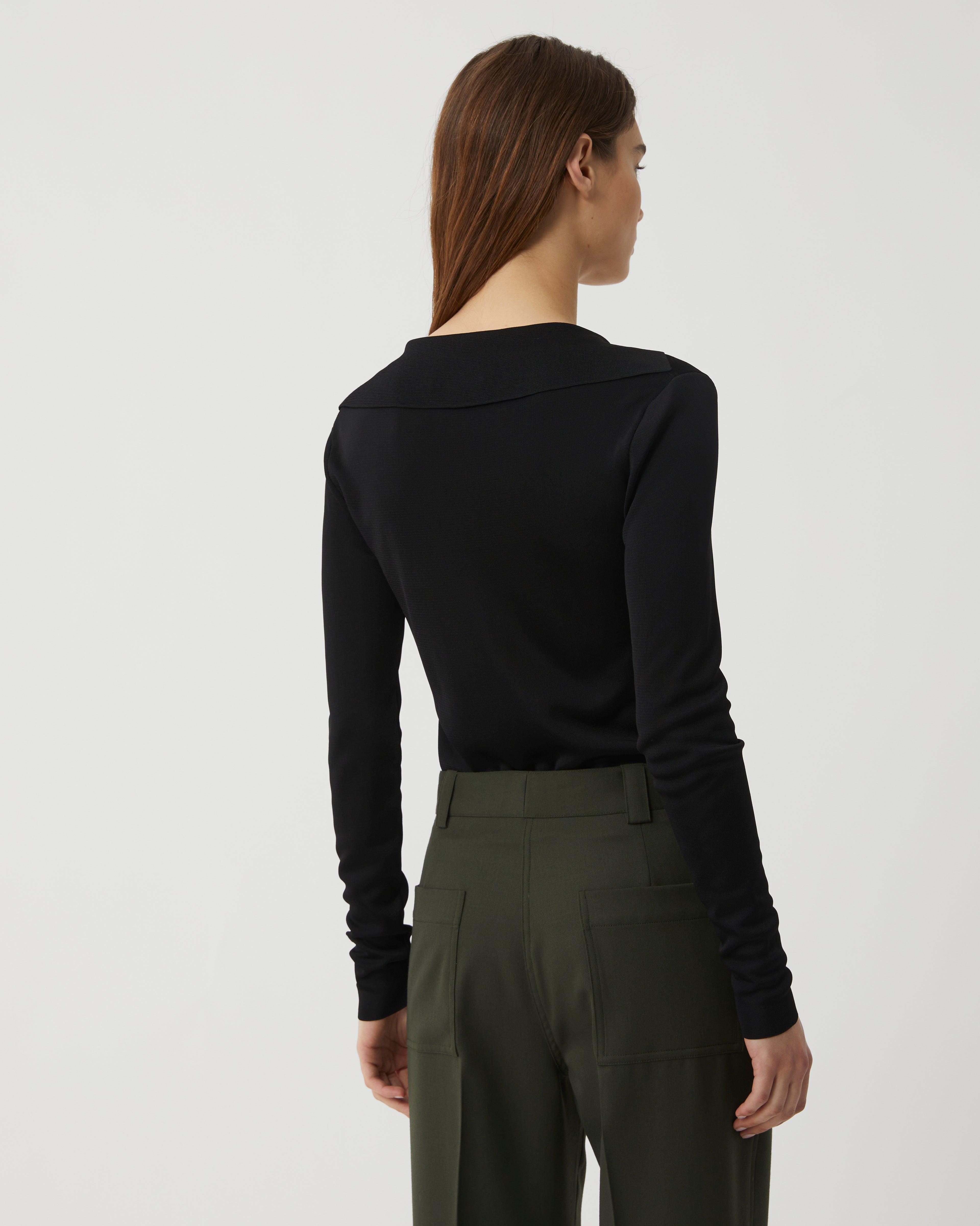 Black Ada Polo knitwear in viscose by Veronica de Piante, featuring a classic collar and button-front design.