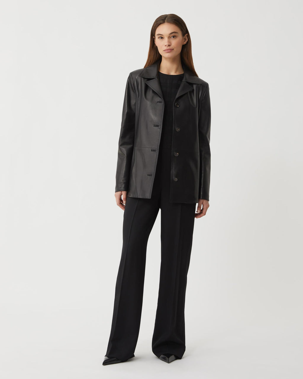 Black Blaire jacket in Nappa leather by Veronica De Piante, shown on a model, stylish and sleek coat perfect for modern fashion.