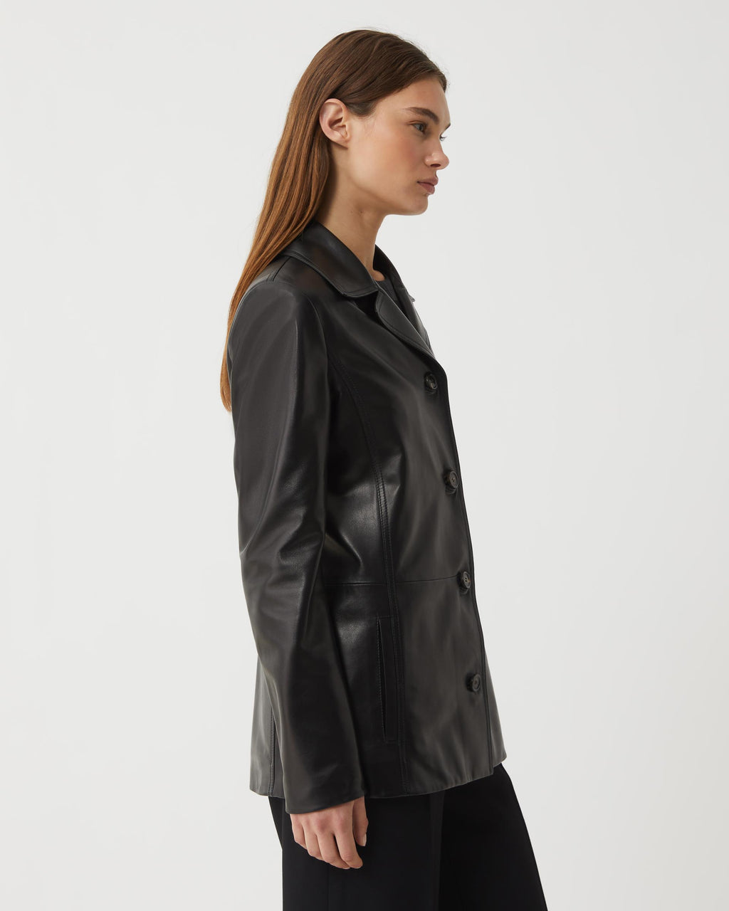 Black Blaire jacket in Nappa leather by Veronica De Piante, showcasing a sleek coat with stylish detailing.
