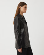Black Blaire jacket in Nappa leather by Veronica De Piante, showcasing a sleek coat with stylish detailing.
