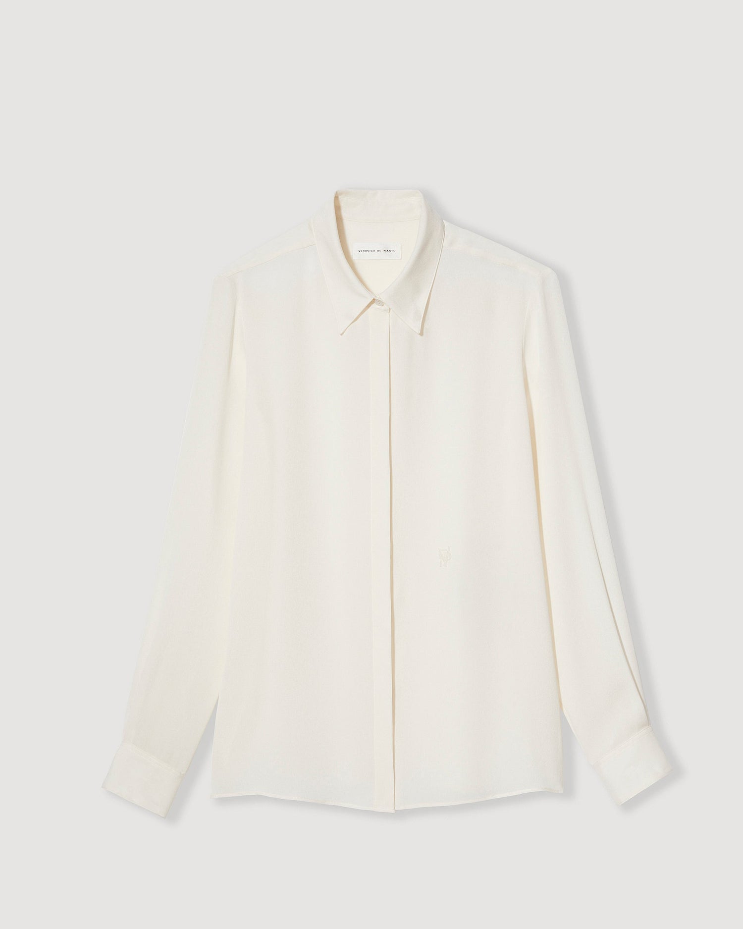Ivory silk georgette Camille shirt from SALE, featuring a lightweight, flowing design and elegant silhouette.