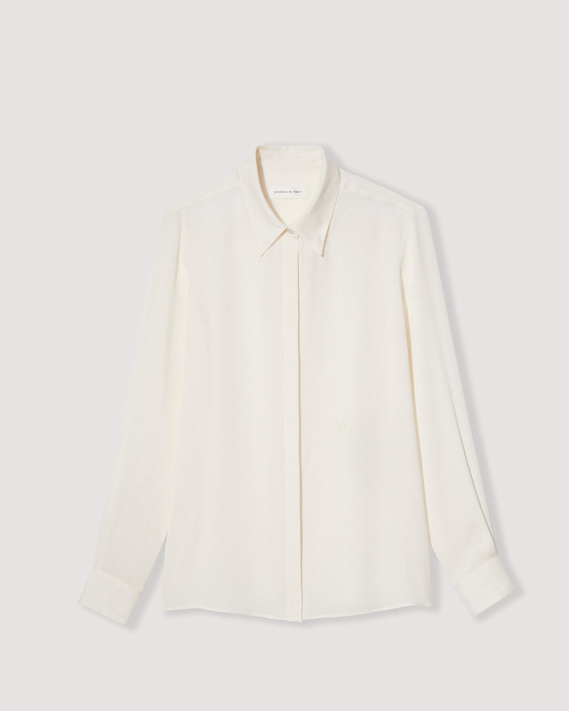 Ivory silk georgette Camille shirt from SALE, featuring a lightweight, flowing design and elegant silhouette.