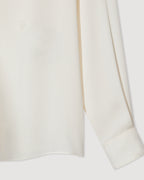 Ivory silk georgette Camille shirt, featuring a flowy design and delicate texture, perfect for stylish layering.