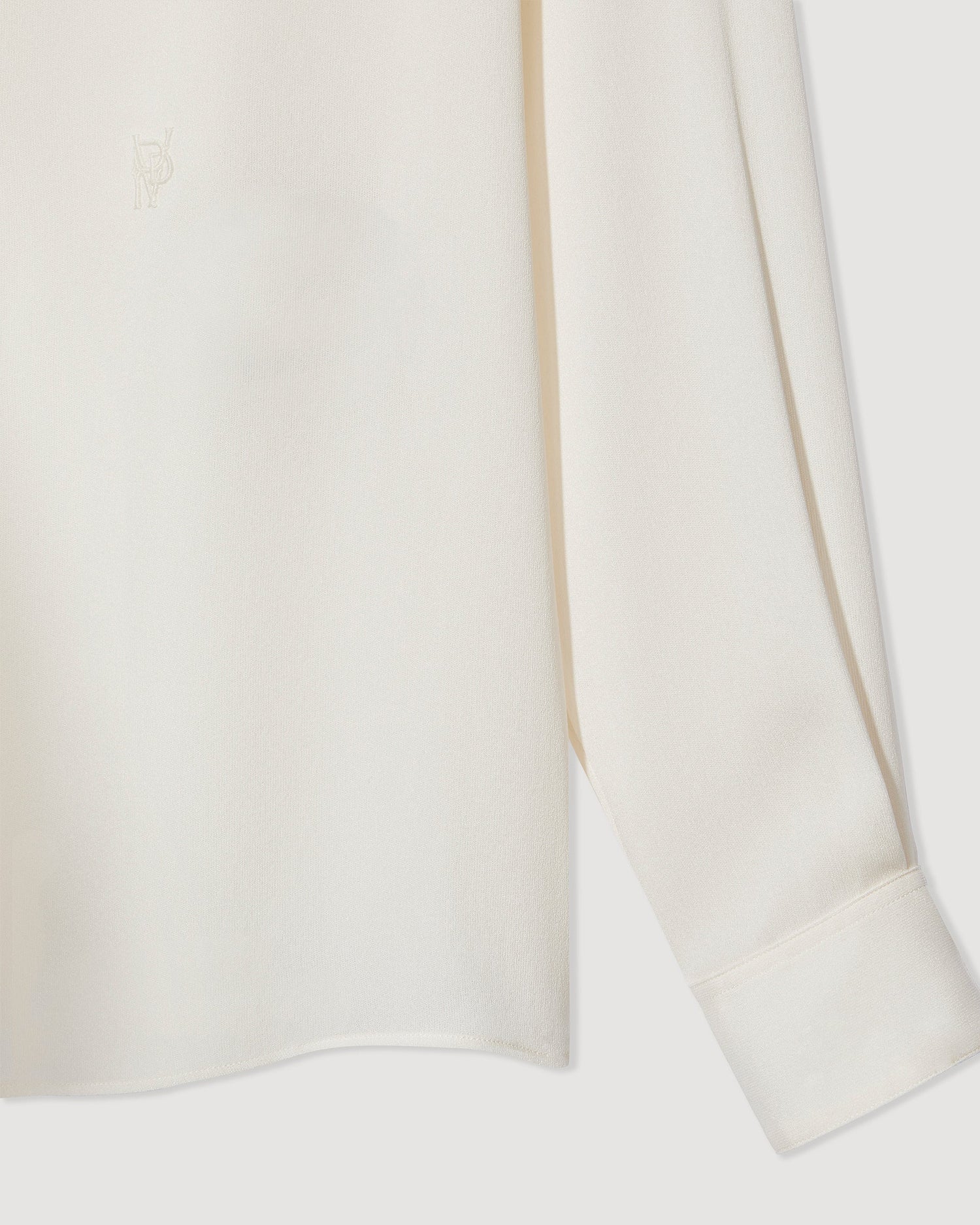 Ivory silk georgette Camille shirt by SALE, featuring a flowy design and elegant silhouette suitable for various occasions.