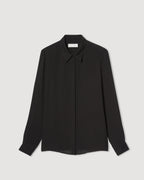 Black silk georgette Camille shirt by SALE, featuring a flowing design and elegant silhouette, displayed on a neutral background.