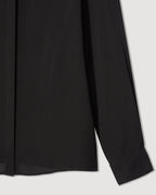 Black silk georgette Camille shirt by SALE, showcasing a flowy design and elegant silhouette.