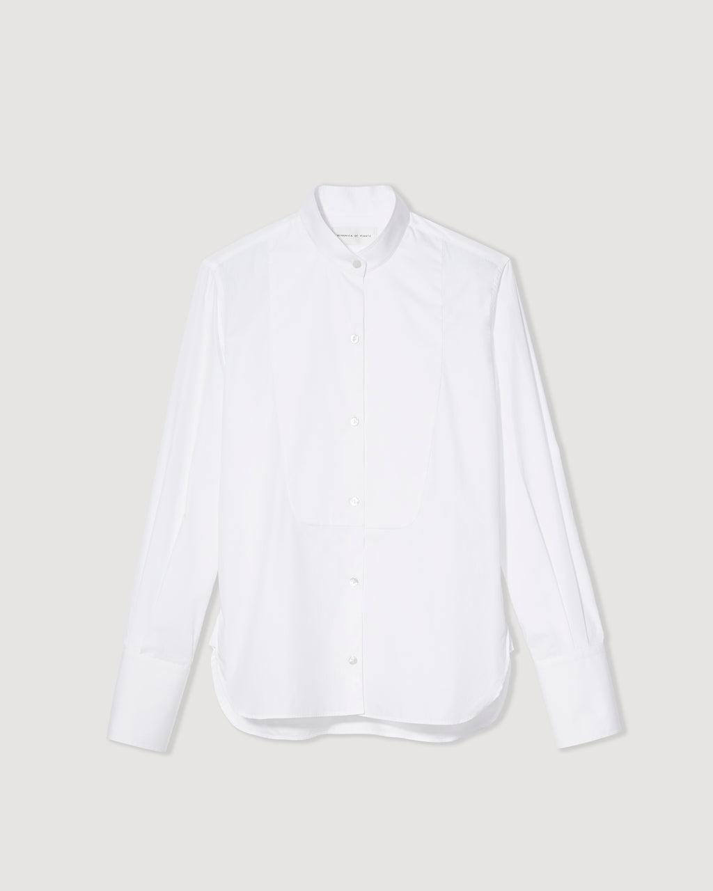 White cotton poplin tuxedo shirt by Veronica De Piante displayed on a flat surface, showcasing its sleek design.