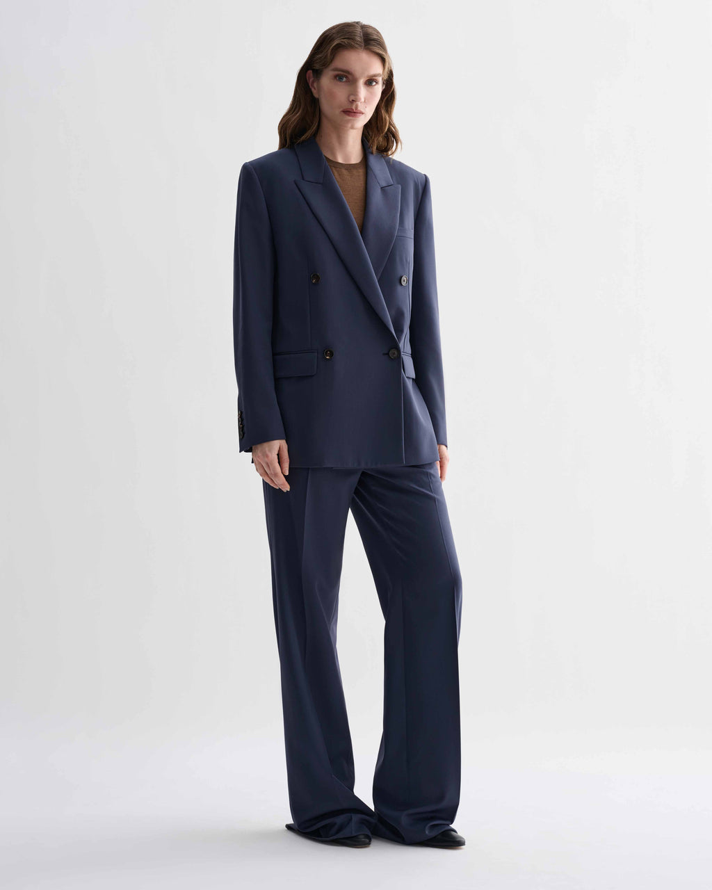 Roman Double Breasted Jacket in Petrol Blue pure wool, menswear-informed tailored blazer and matching trousers on a female model